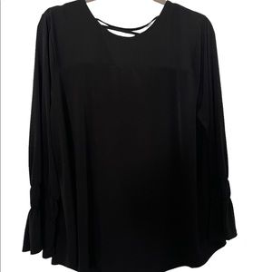 New Chico’s top with details on back and sleeves.